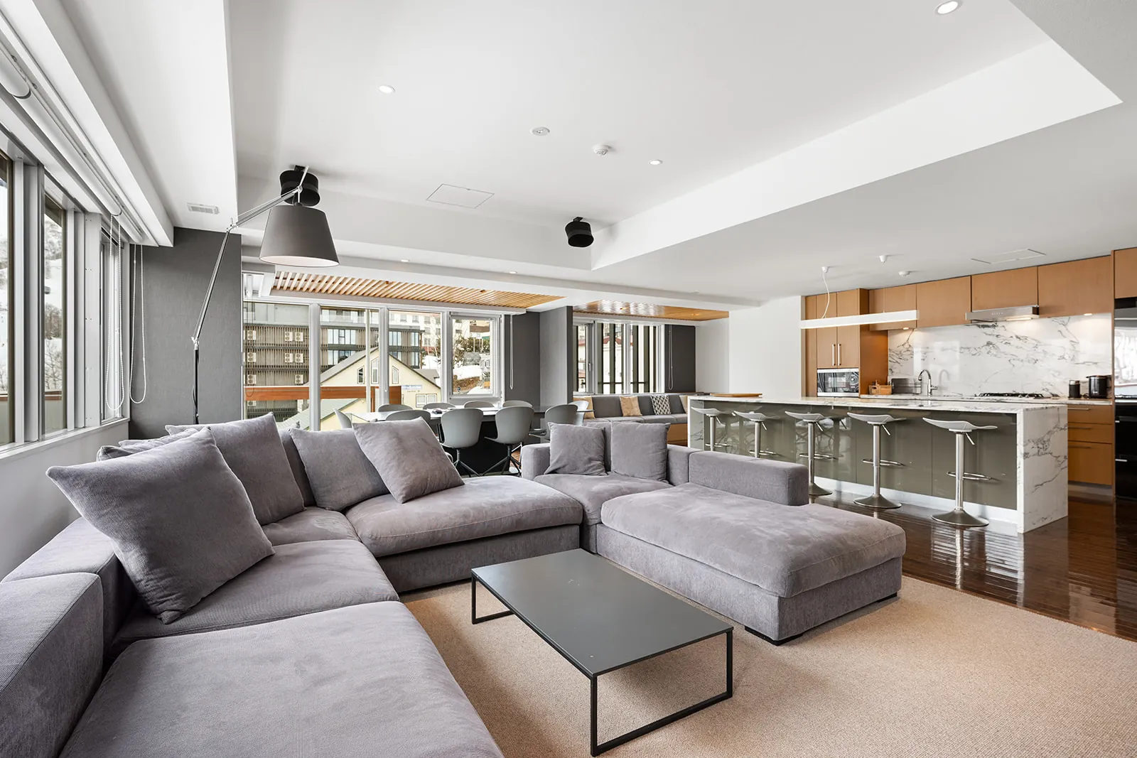 Open plan living room and kitchen in a guest residence at Alpen Ridge Hotel Niseko