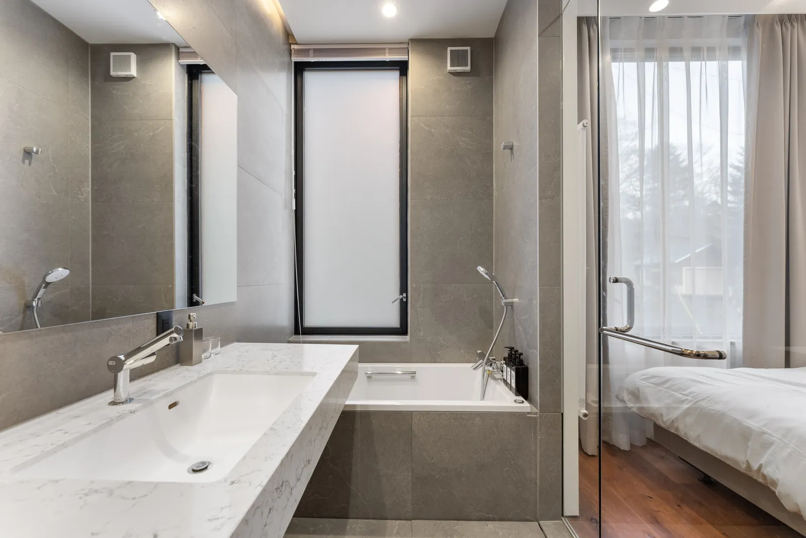 Stone basin and bath at Aoyama Villa Niseko