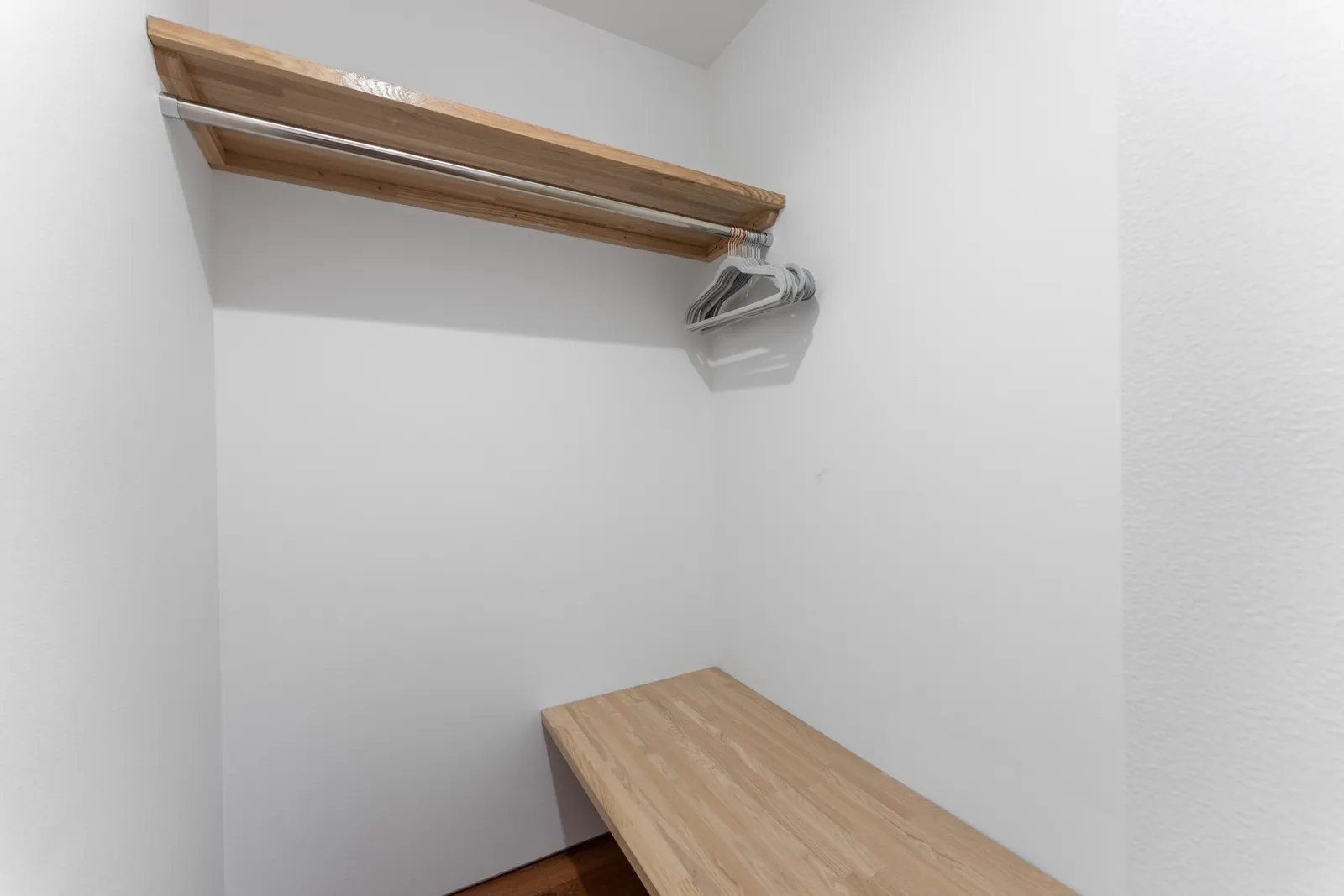 Entry with ski storage and bench at Aoyama Villa Niseko