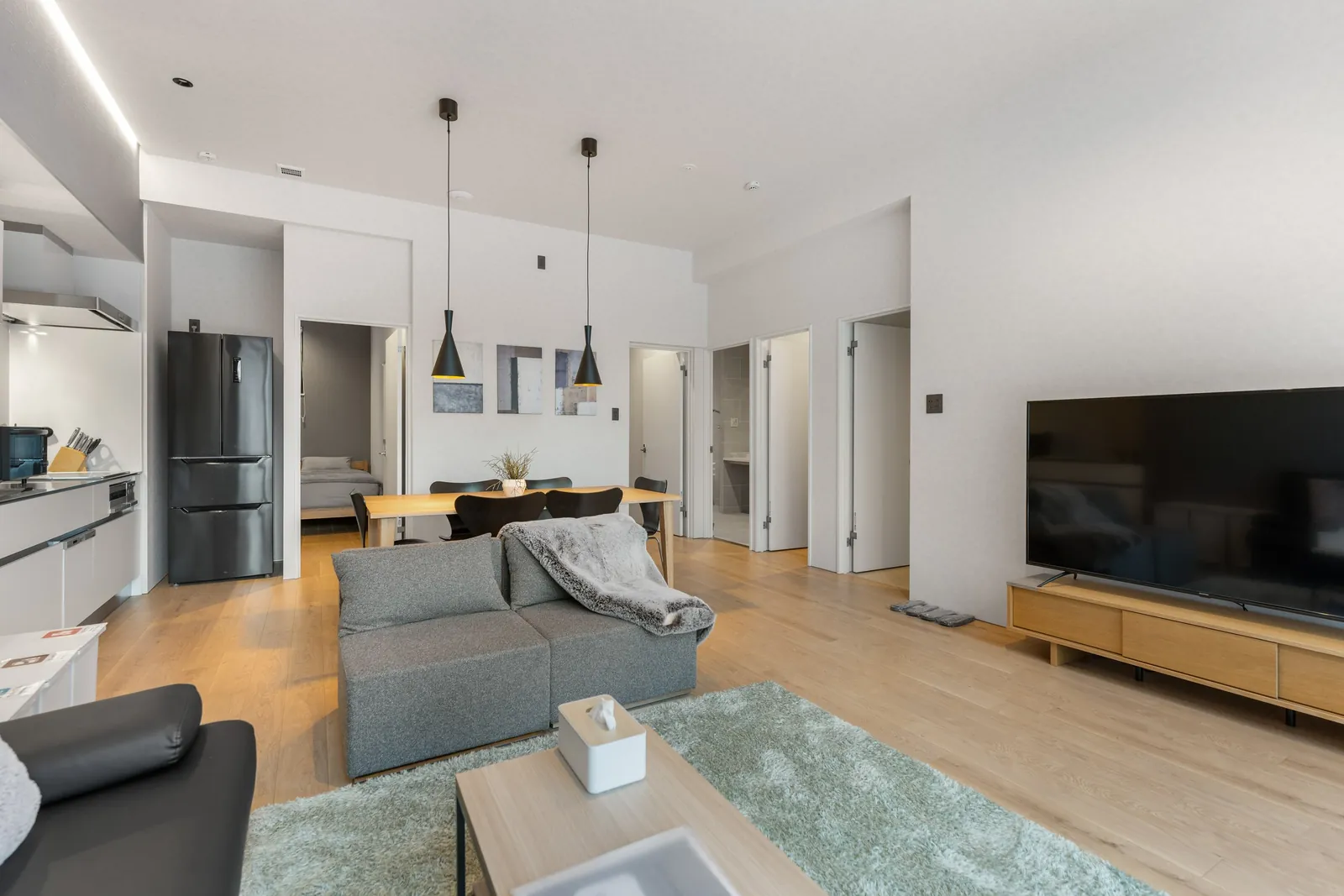 Living room and kitchen at Bisha Niseko