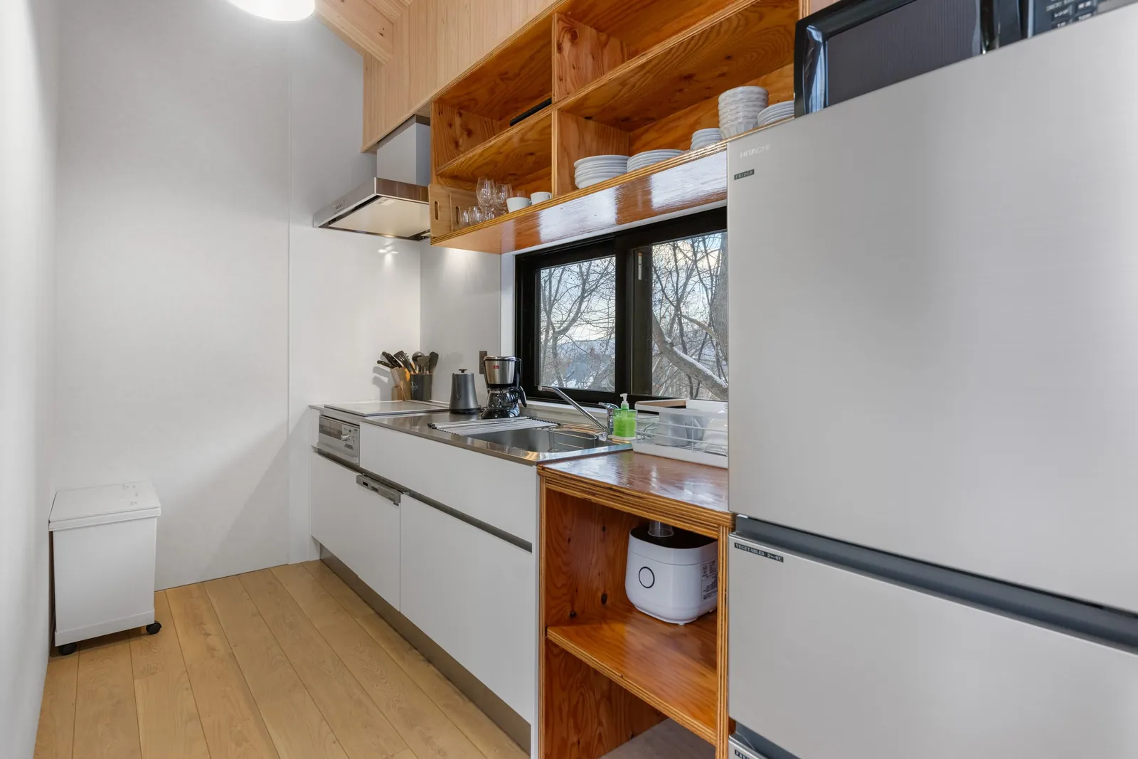 Kitchen with timber shelving at Dreamlife Niseko