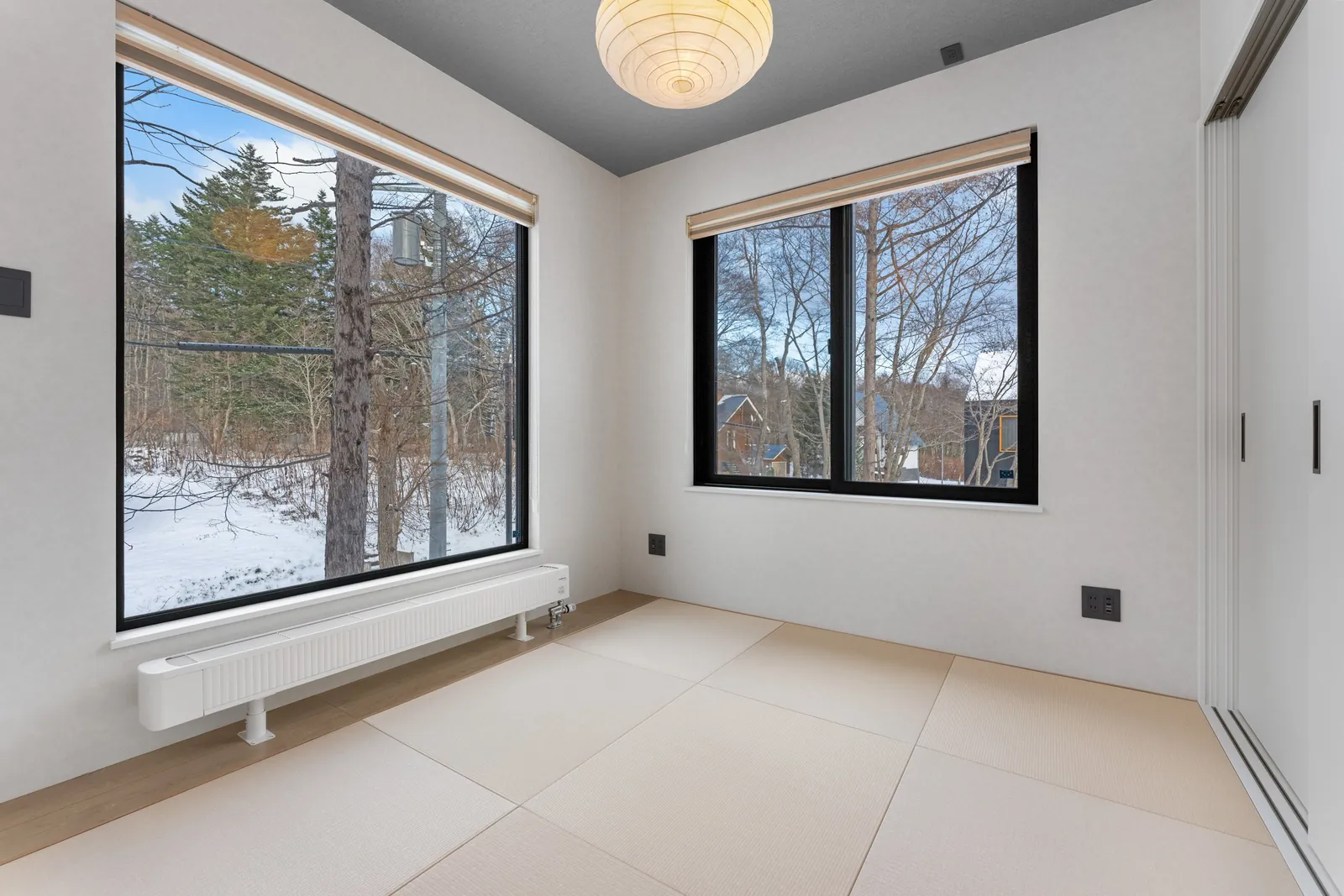 Tatami room with forest view at Dreamlife Niseko