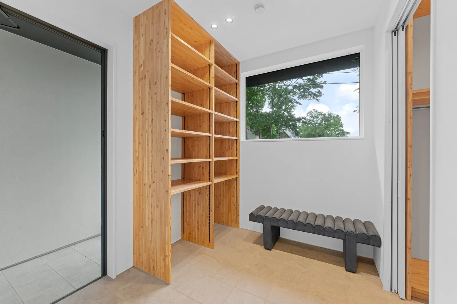 Entry with timber shelving and bench, Hanazaki Royal Town