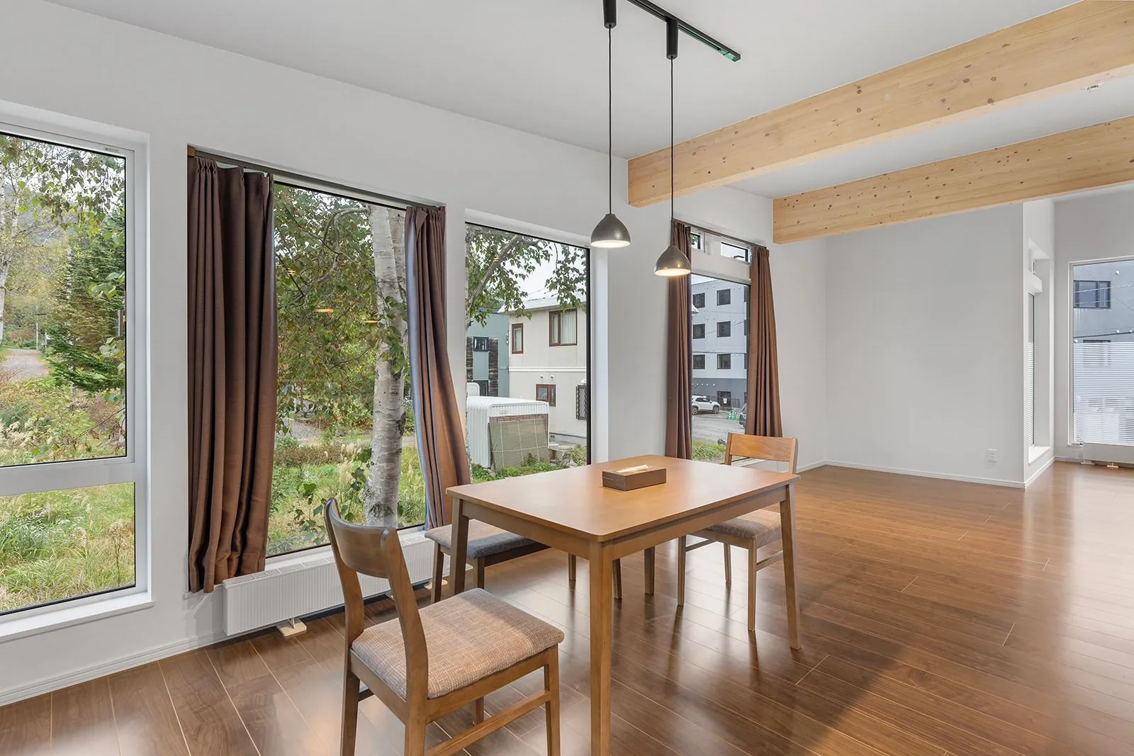 Dining table by the window at Hikari House