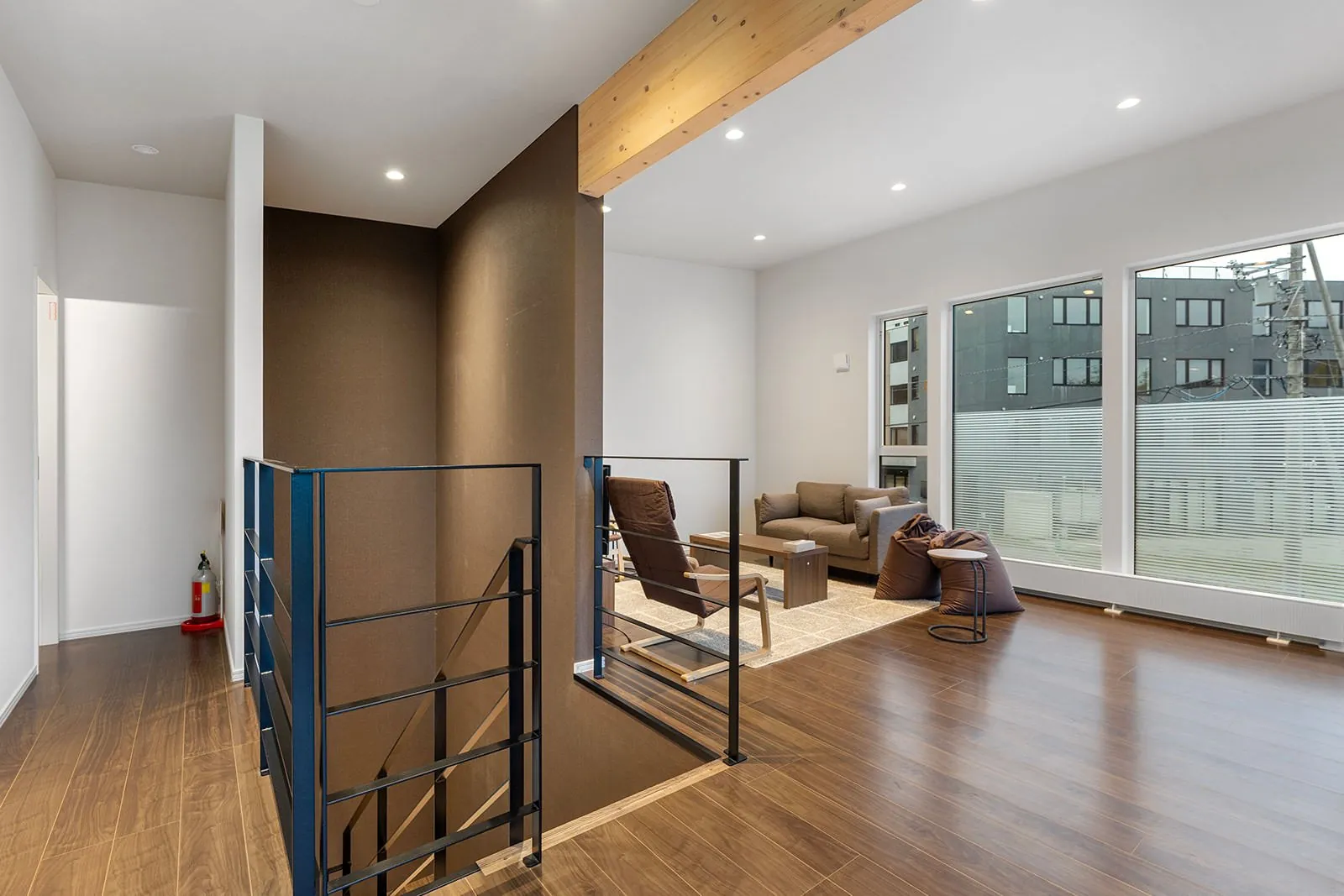Living area and stair void at Hikari House