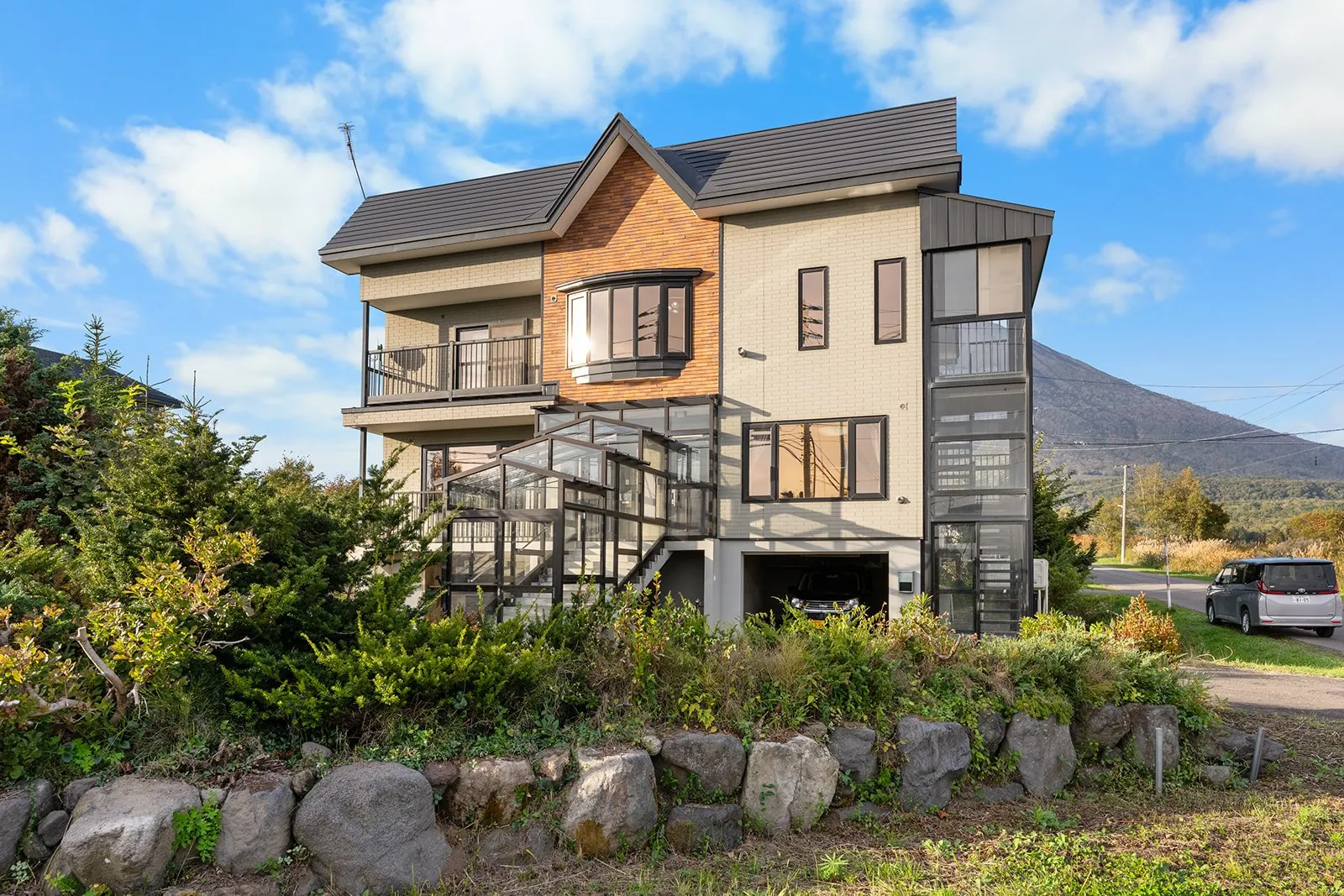 Makkari House exterior and stone garden