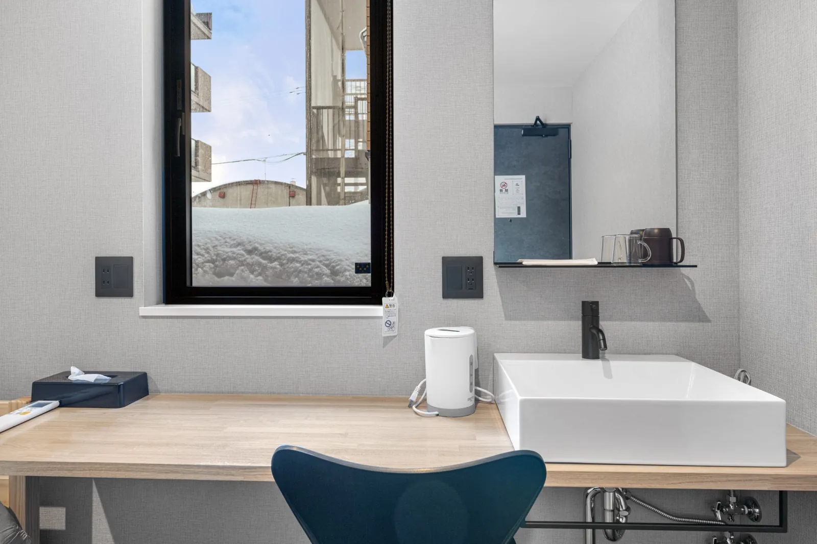 MOD Kutchan desk and basin by a winter window
