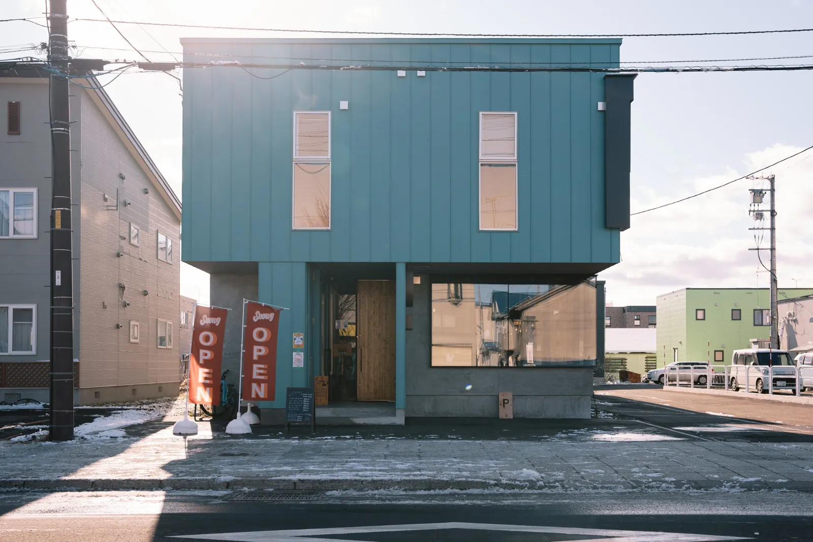 Snowy Cafe Niseko building exterior in daylight
